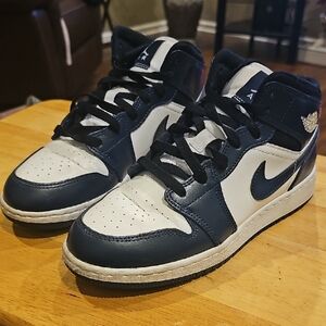 Nike Air Jordan 1 Navy Blue and White Mid-Top Sneakers